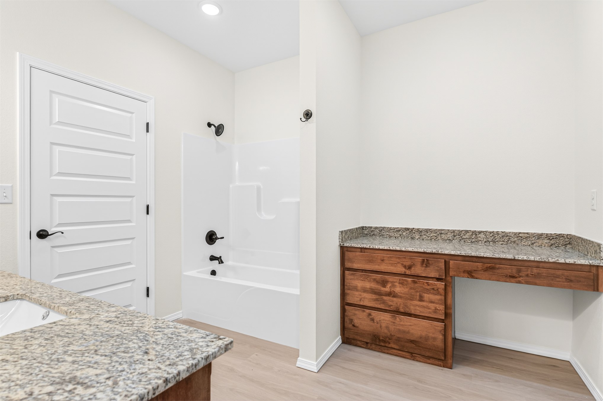 124 Countryside Way Pocola, OK 74902 - Photo 31 of 39 Built-in vanity with wood-finish cabinetry, light-toned countertop, and recessed lighting