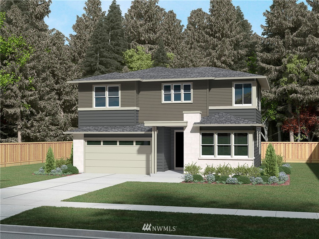 5007 Southeast 3rd Place Renton, WA 98059 - Photo 1 of 1 a front view of a house with a garden