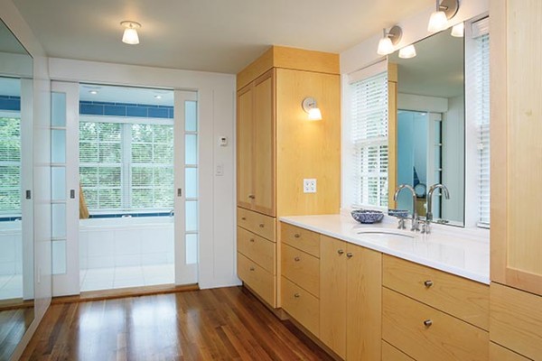 76 Denny Road Brookline, MA 02467 - Photo 6 of 11 a bathroom with a sink mirror and a window