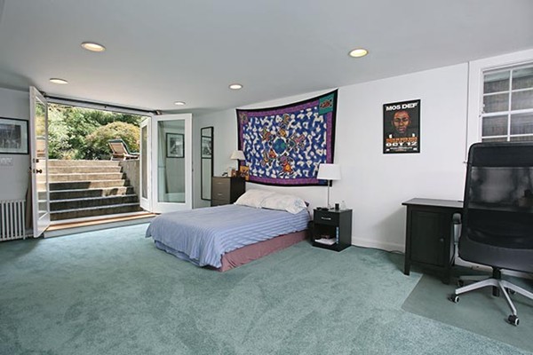 76 Denny Road Brookline, MA 02467 - Photo 8 of 11 a bedroom with a bed and wooden floor