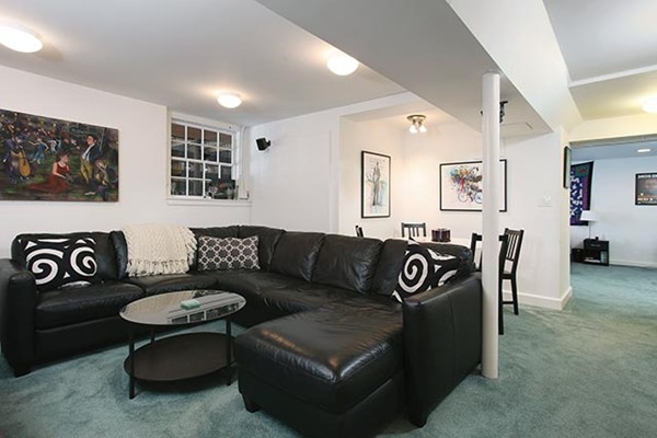 76 Denny Road Brookline, MA 02467 - Photo 9 of 11 a living room with furniture a rug and a window