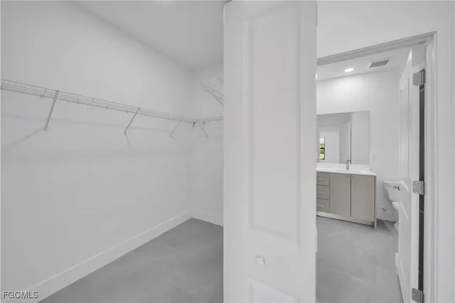 a view of a room with a big yard