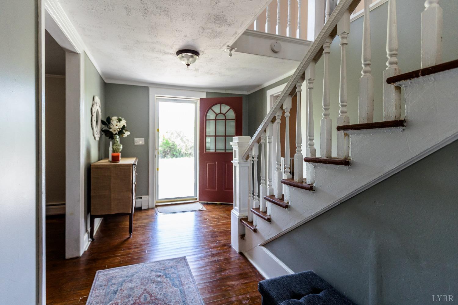 1564 Swan Road Pamplin, VA 23958 - Photo 12 of 60 a view of entryway and hall with wooden floor