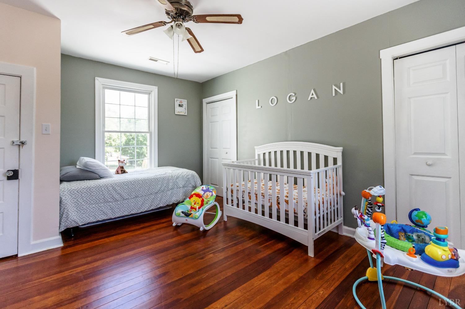 1564 Swan Road Pamplin, VA 23958 - Photo 32 of 60 a bedroom with bed and a window