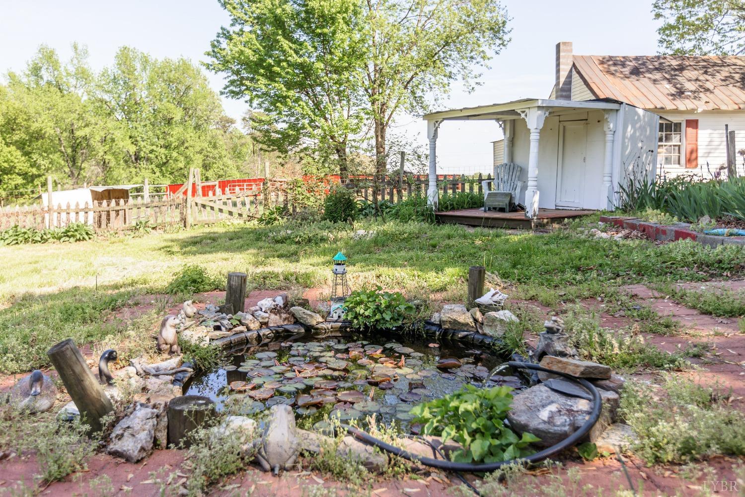 1564 Swan Road Pamplin, VA 23958 - Photo 49 of 60 a view of a house with backyard and sitting area
