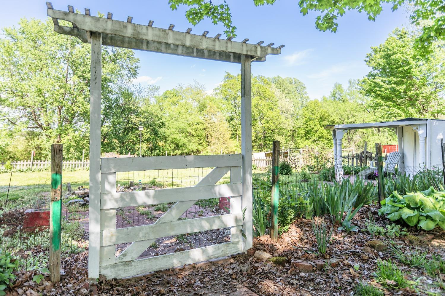 1564 Swan Road Pamplin, VA 23958 - Photo 51 of 60 a view of a back yard from a balcony