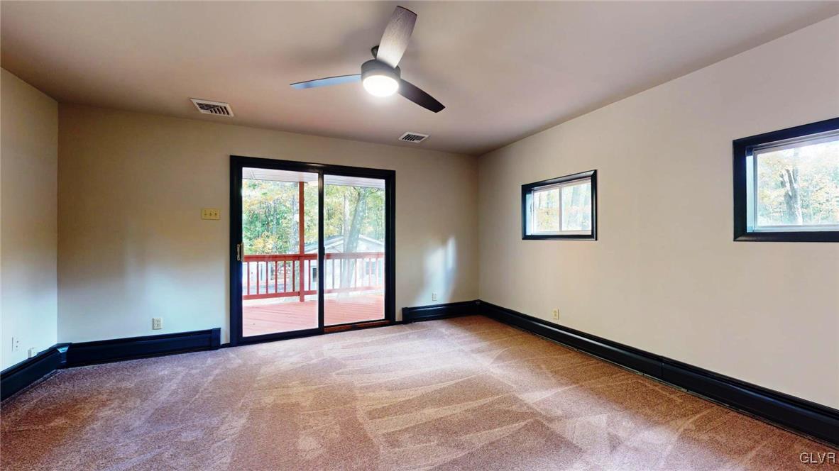 8713 Lincoln Green Drive Kunkletown, PA 18058 - Photo 22 of 42 a view of an empty room with a window