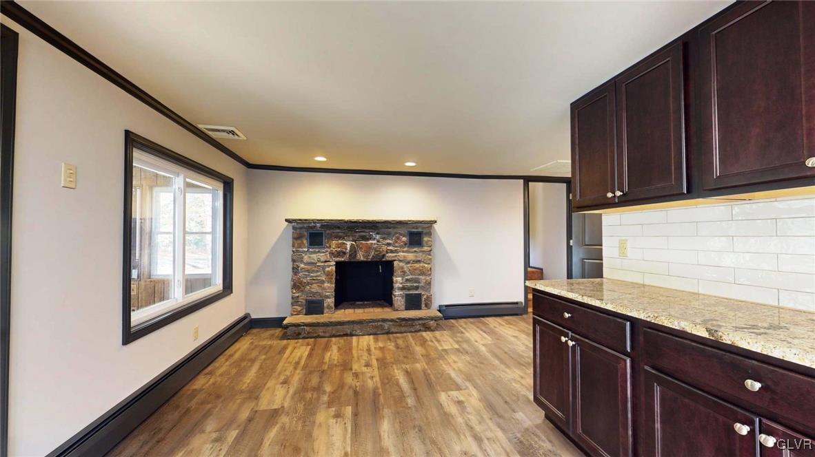 8713 Lincoln Green Drive Kunkletown, PA 18058 - Photo 8 of 42 a view of kitchen with granite countertop stainless steel appliances stove sink and cabinets