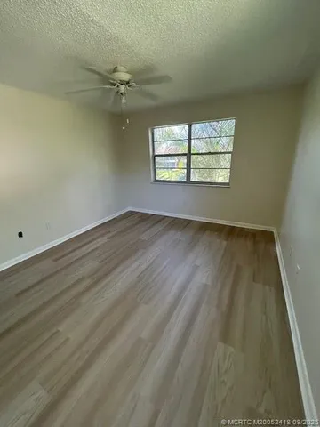 an empty room that has a window
