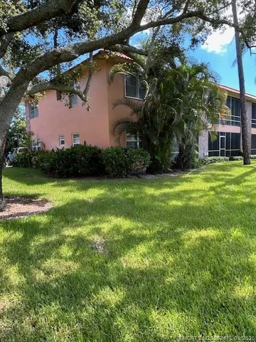 a street sign on a side of building