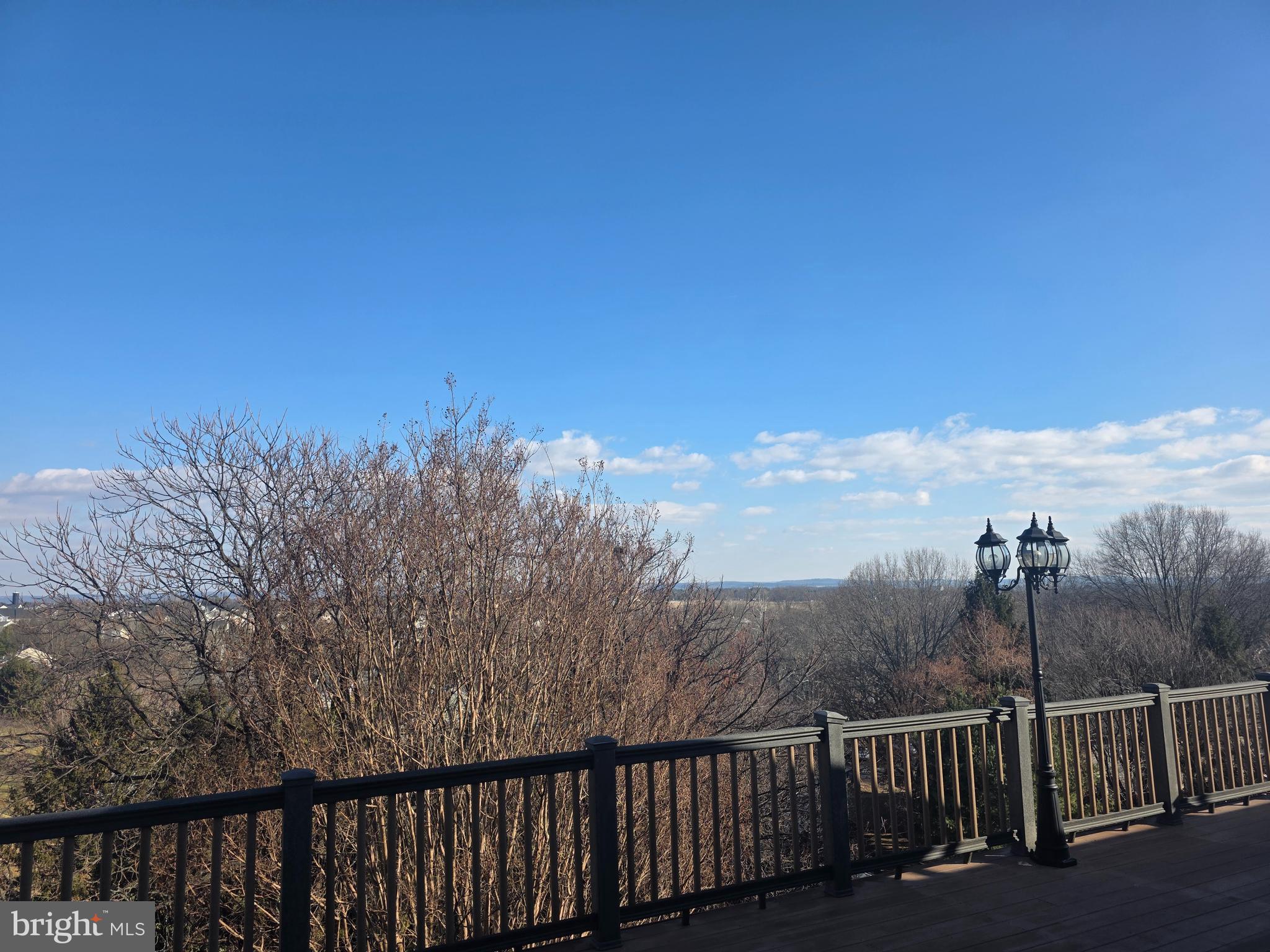 2409 Barrett Court Frederick, MD 21702 - Photo 5 of 19 a view of a balcony with wooden fence
