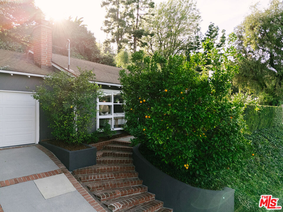 3346 Coy Drive Sherman Oaks, CA 91423 - Photo 2 of 41 a view of a house with a yard
