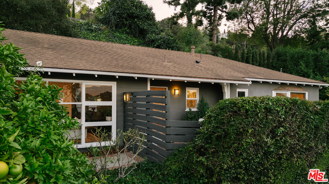 3346 Coy Drive Sherman Oaks, CA 91423 - Photo 3 of 41 a aerial view of a house next to a yard
