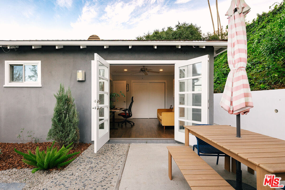 3346 Coy Drive Sherman Oaks, CA 91423 - Photo 32 of 41 a view of a house with backyard and sitting area