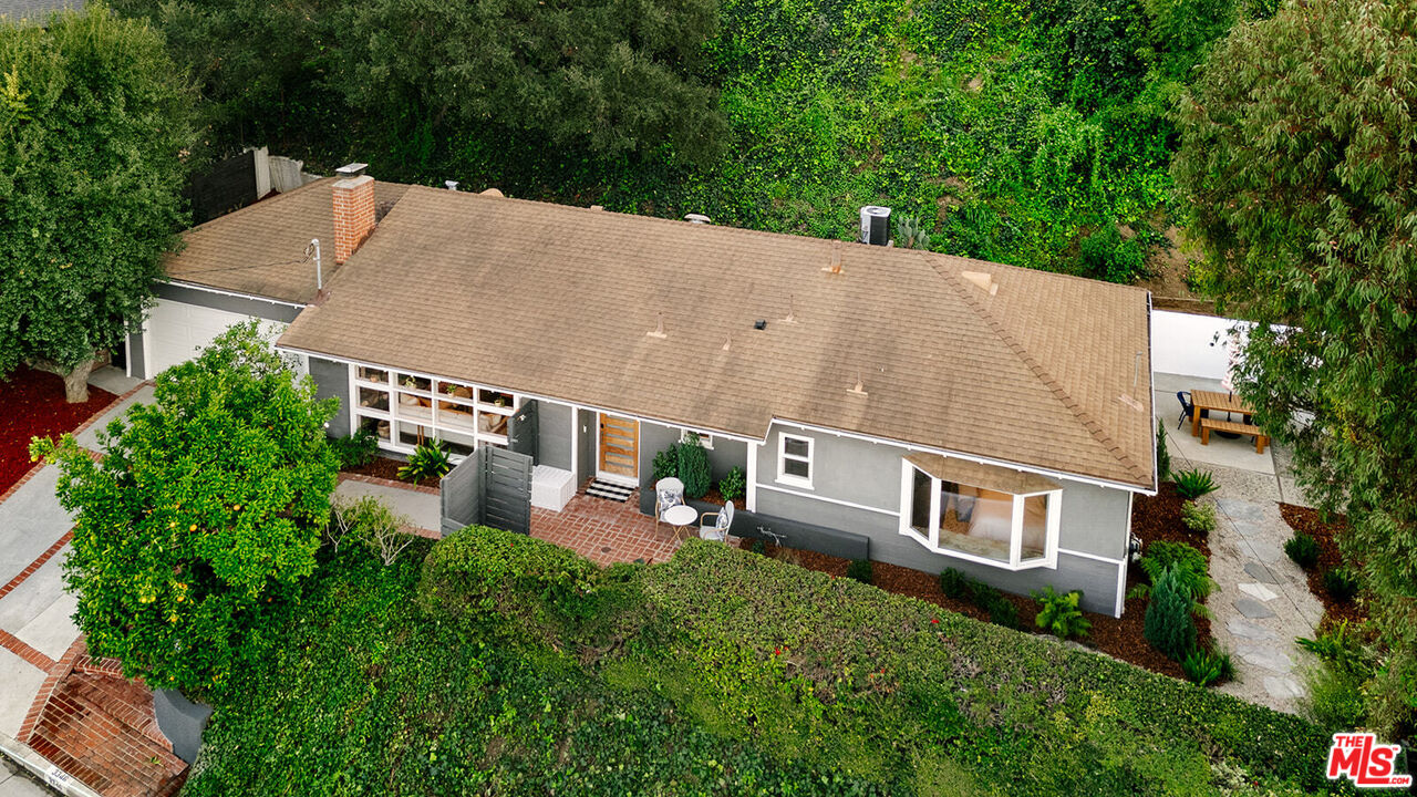 3346 Coy Drive Sherman Oaks, CA 91423 - Photo 38 of 41 an aerial view of a house with swimming pool and garden view