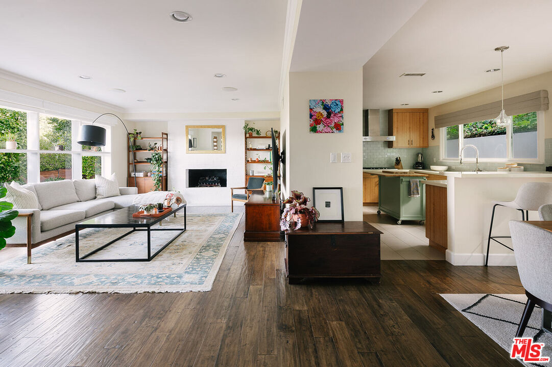 3346 Coy Drive Sherman Oaks, CA 91423 - Photo 6 of 41 a living room with fireplace furniture and a wooden floor