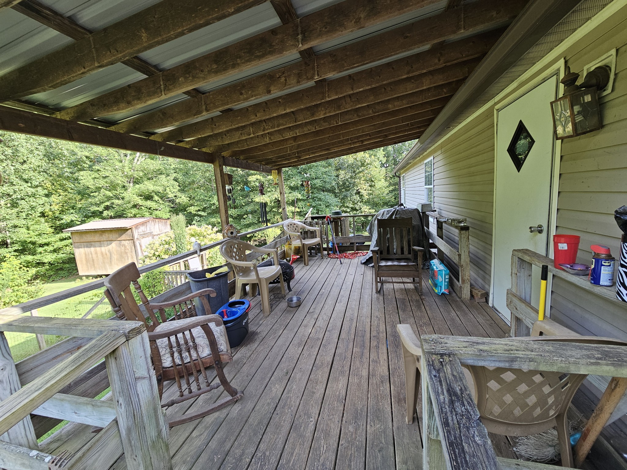 5980 Coxburg Road South Sugar Tree, TN 38380 - Photo 15 of 34 Covered deck on back of house.