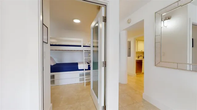 a bathroom with a bathtub and a sink