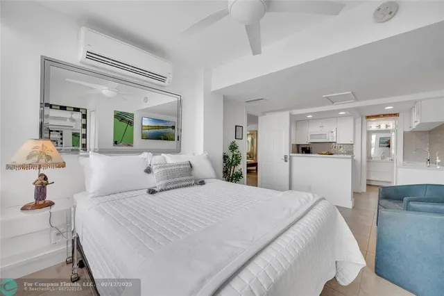 a kitchen with a sink a stove and cabinets