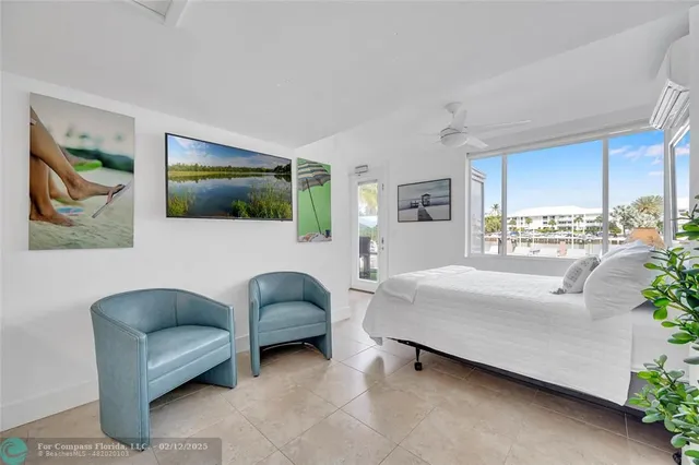 a bathroom with a sink a toilet a mirror and shower