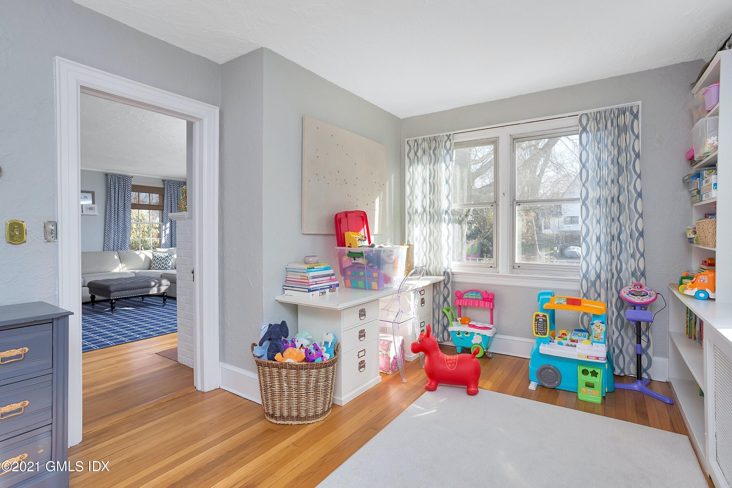 24 Valleywood Road Cos Cob, CT 06830 - Photo 11 of 24 a play room with toys