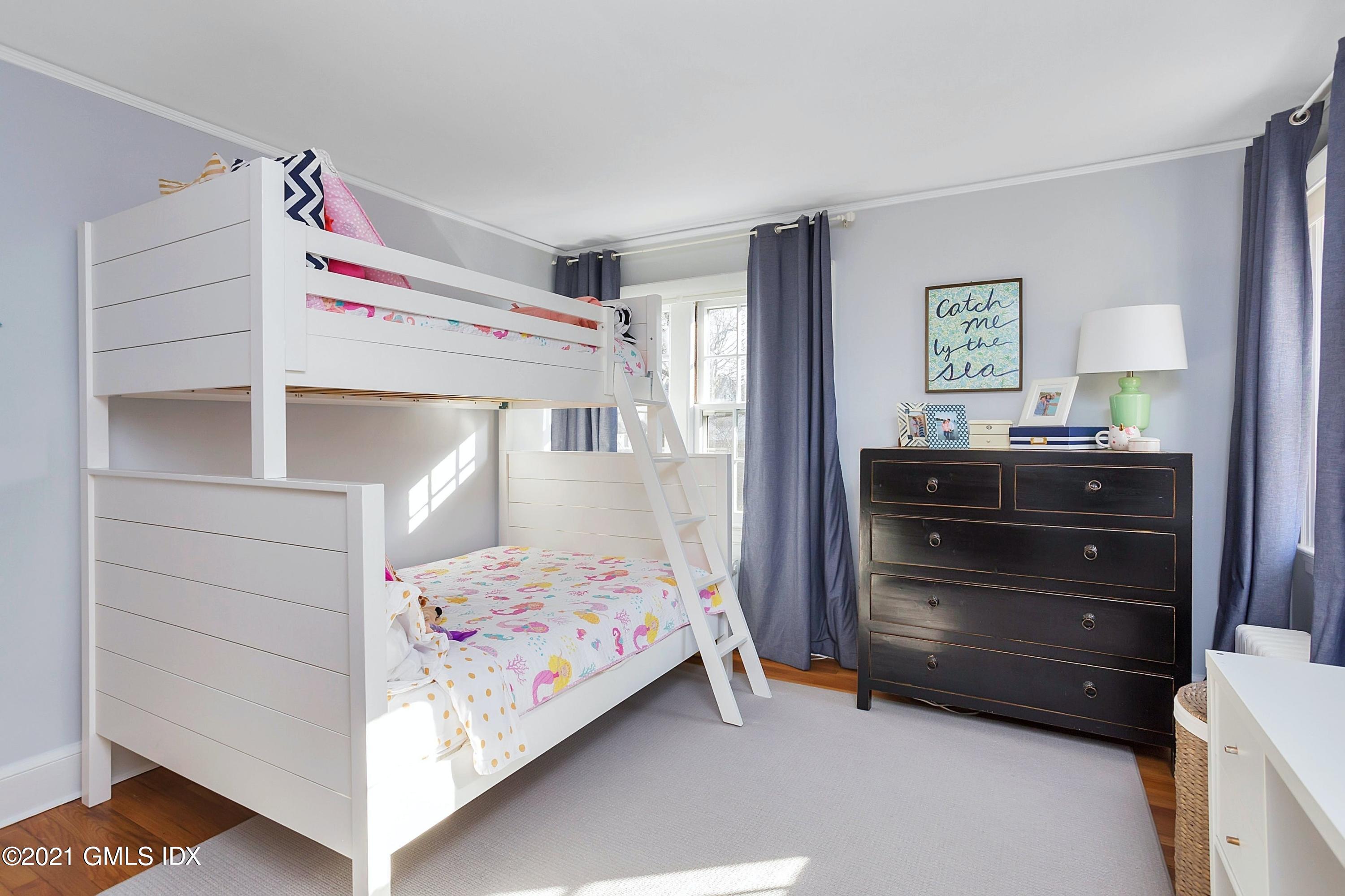 24 Valleywood Road Cos Cob, CT 06830 - Photo 14 of 24 a bedroom with a bed and a dresser