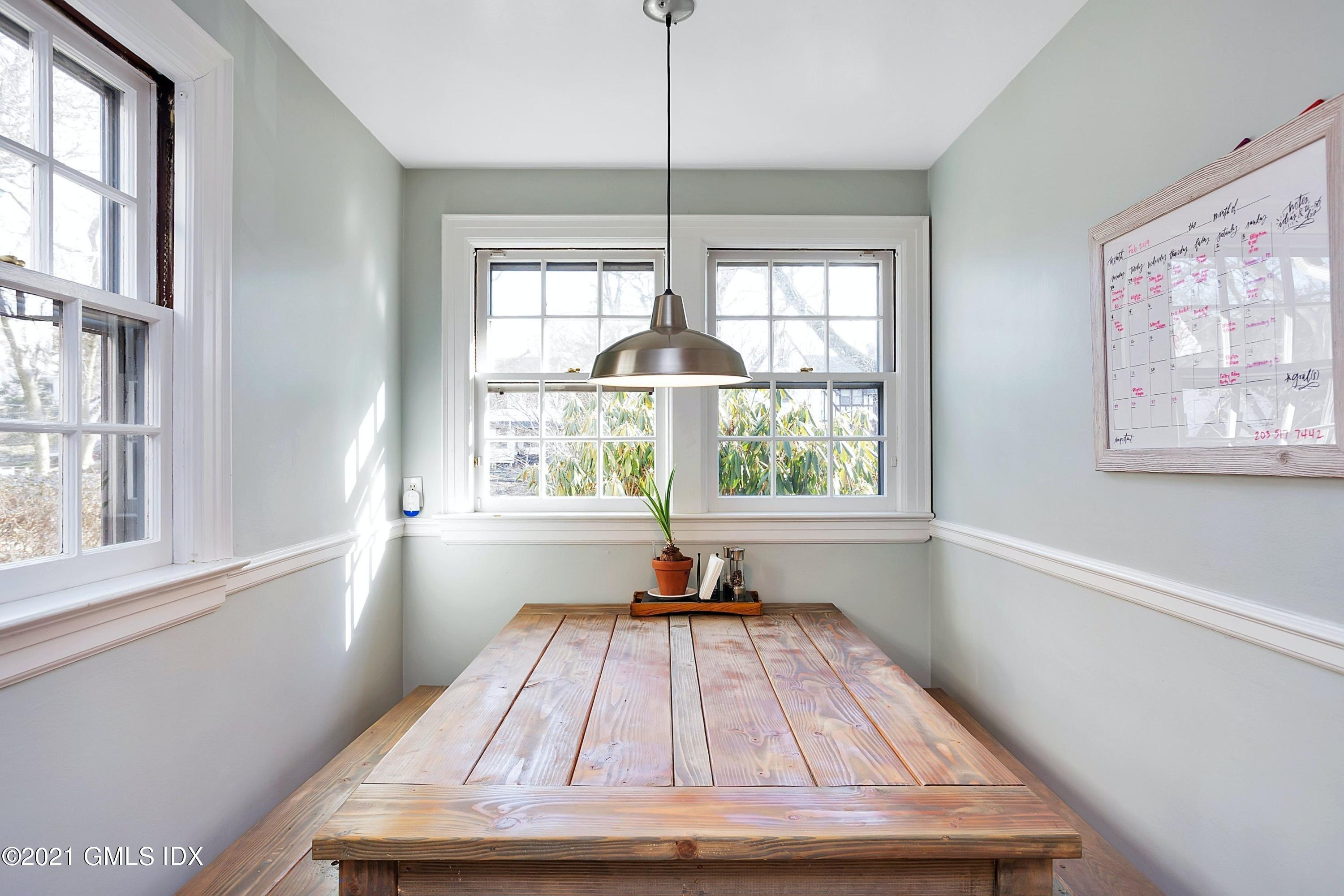 24 Valleywood Road Cos Cob, CT 06830 - Photo 5 of 24 a view of a livingroom with furniture wooden floor and a chandelier