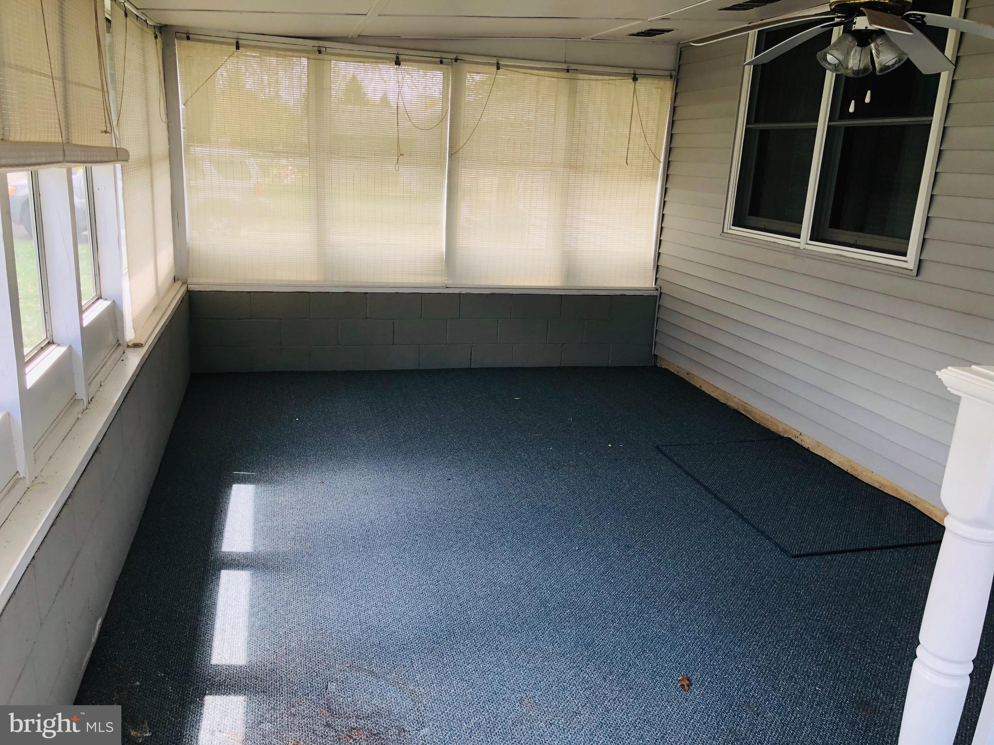 31 Mahoney Road Pennsville, NJ 08070 - Photo 6 of 8 Enclosed back porch