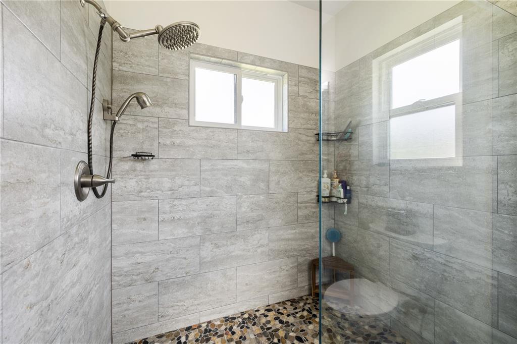 5149 Southwest 119th Road Lake Butler, FL 32054 - Photo 7 of 40 a bathroom with a shower