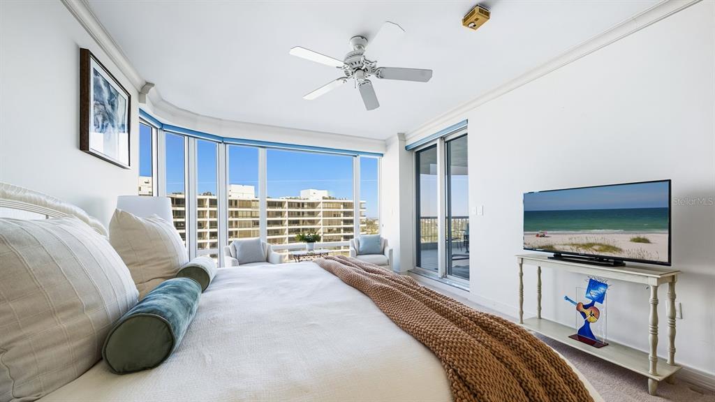 455 Longboat Club Road, Unit 707 Longboat Key, FL 34228 - Photo 35 of 69 a bedroom with a bed and a flat screen tv