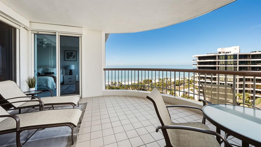 455 Longboat Club Road, Unit 707 Longboat Key, FL 34228 - Photo 42 of 69 a balcony with chairs