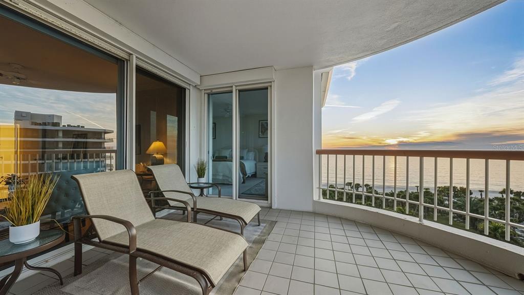 455 Longboat Club Road, Unit 707 Longboat Key, FL 34228 - Photo 43 of 69 a view of a balcony with chair and table