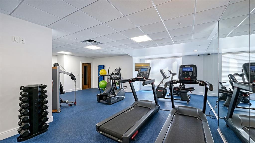455 Longboat Club Road, Unit 707 Longboat Key, FL 34228 - Photo 61 of 69 a view of a room with gym equipment