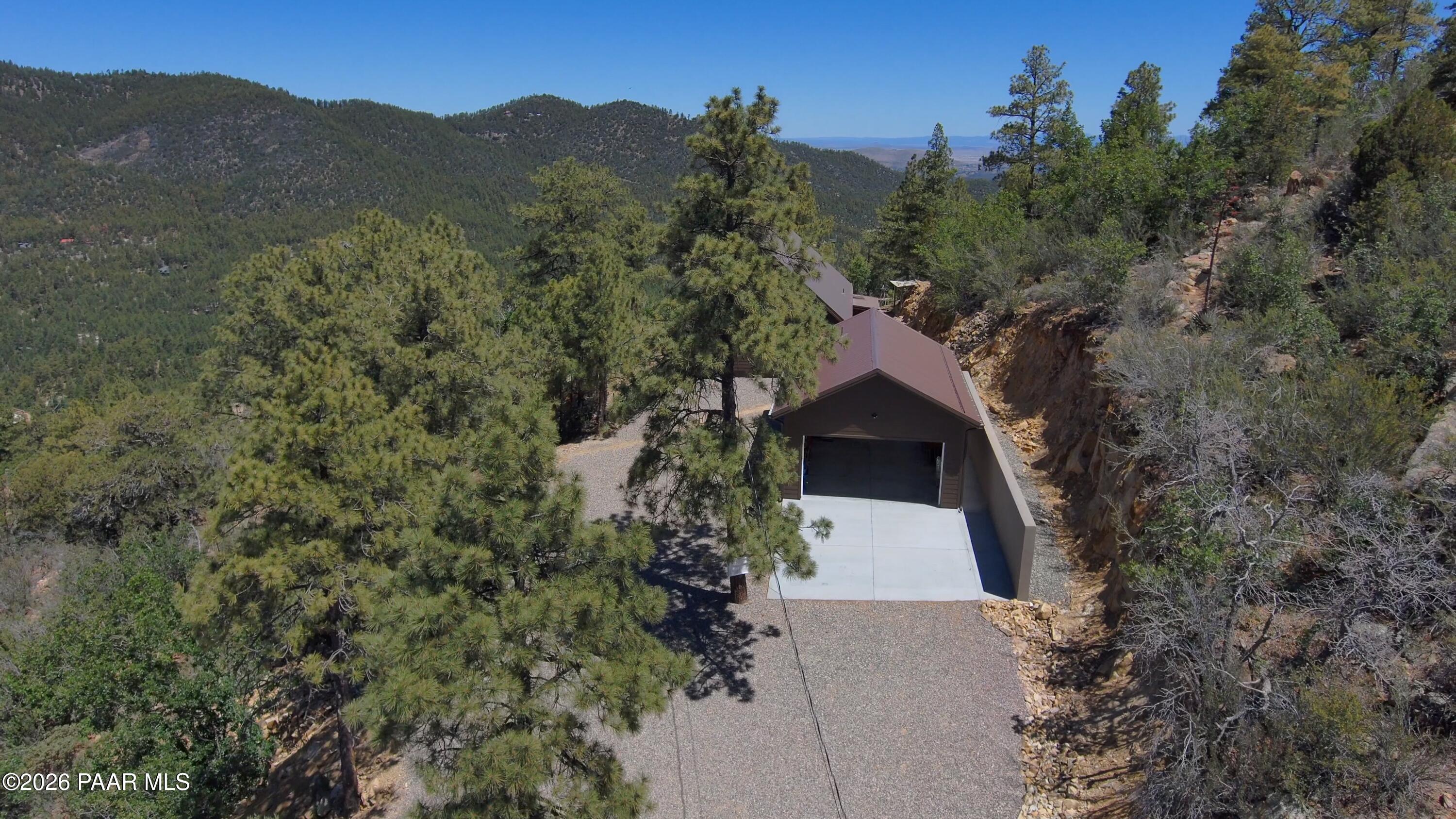 7251 South Big Bug Mesa Road Mayer, AZ 86333 - Photo 38 of 55 an aerial view of a house with a yard and trees
