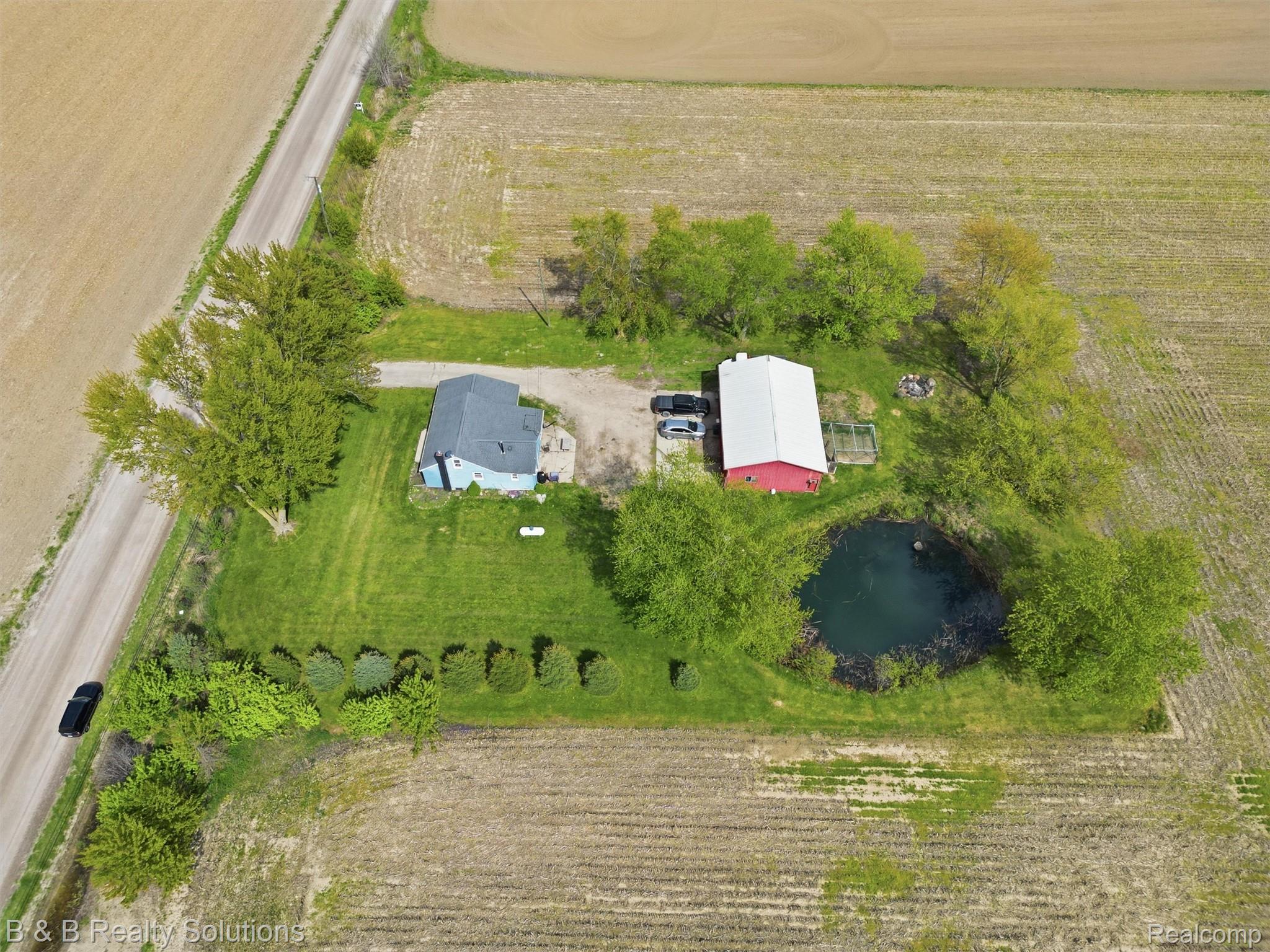 21900 Bordman Road Armada, MI 48005 - Photo 14 of 55 View of rural area featuring rows of crops
