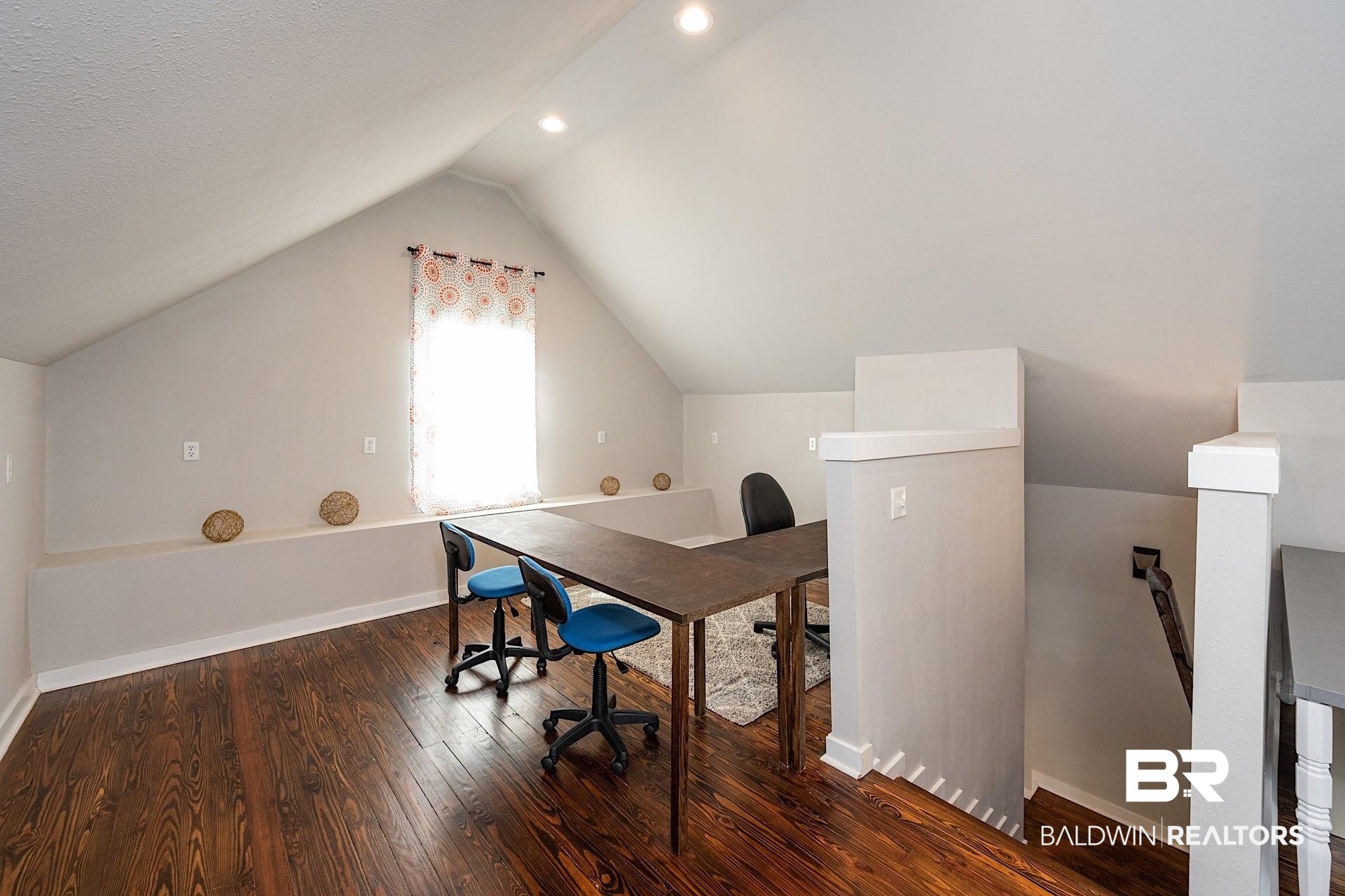 22051 Broad Street Silverhill, AL 36576 - Photo 16 of 28 Office space featuring dark hardwood / wood-style flooring and lofted ceiling