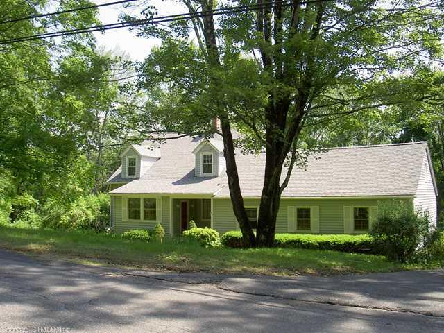 848 S Road Harwinton, CT 06791 - Photo 1 of 1 a front view of a house with a yard and a garage