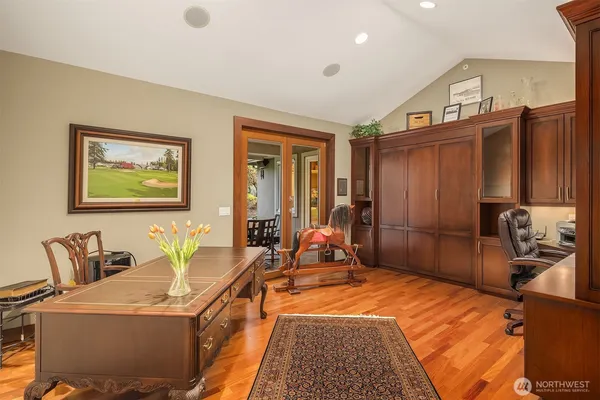 a bedroom with furniture and a walk in closet