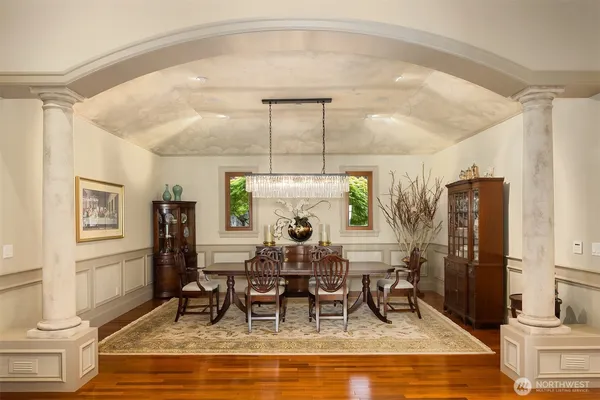 a view of a dining room with furniture window and outside view