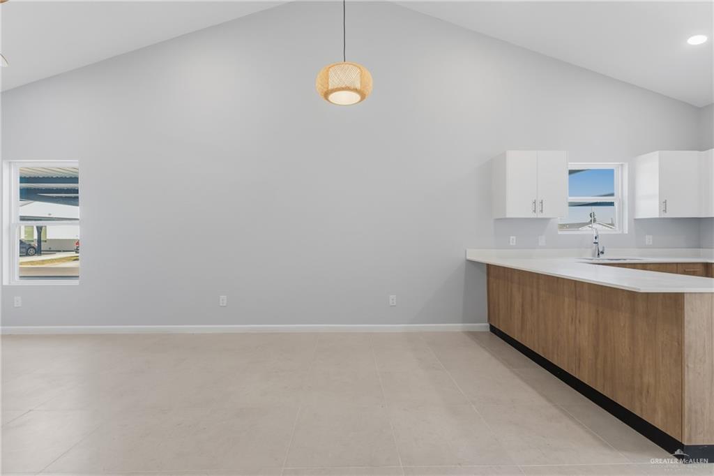 2612 Mockingbird Road, Unit 4 Weslaco, TX 78596 - Photo 4 of 11 a bathroom with a sink and a window