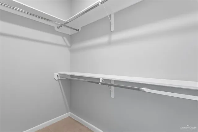 a view of a room with racks on the wall