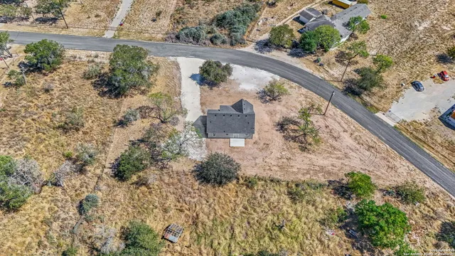 a view of a lake from a balcony with outdoor space