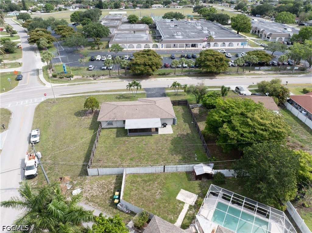 4960 20th Place Southwest Naples, FL 34116 - Photo 30 of 33 an aerial view of residential houses with outdoor space and swimming pool