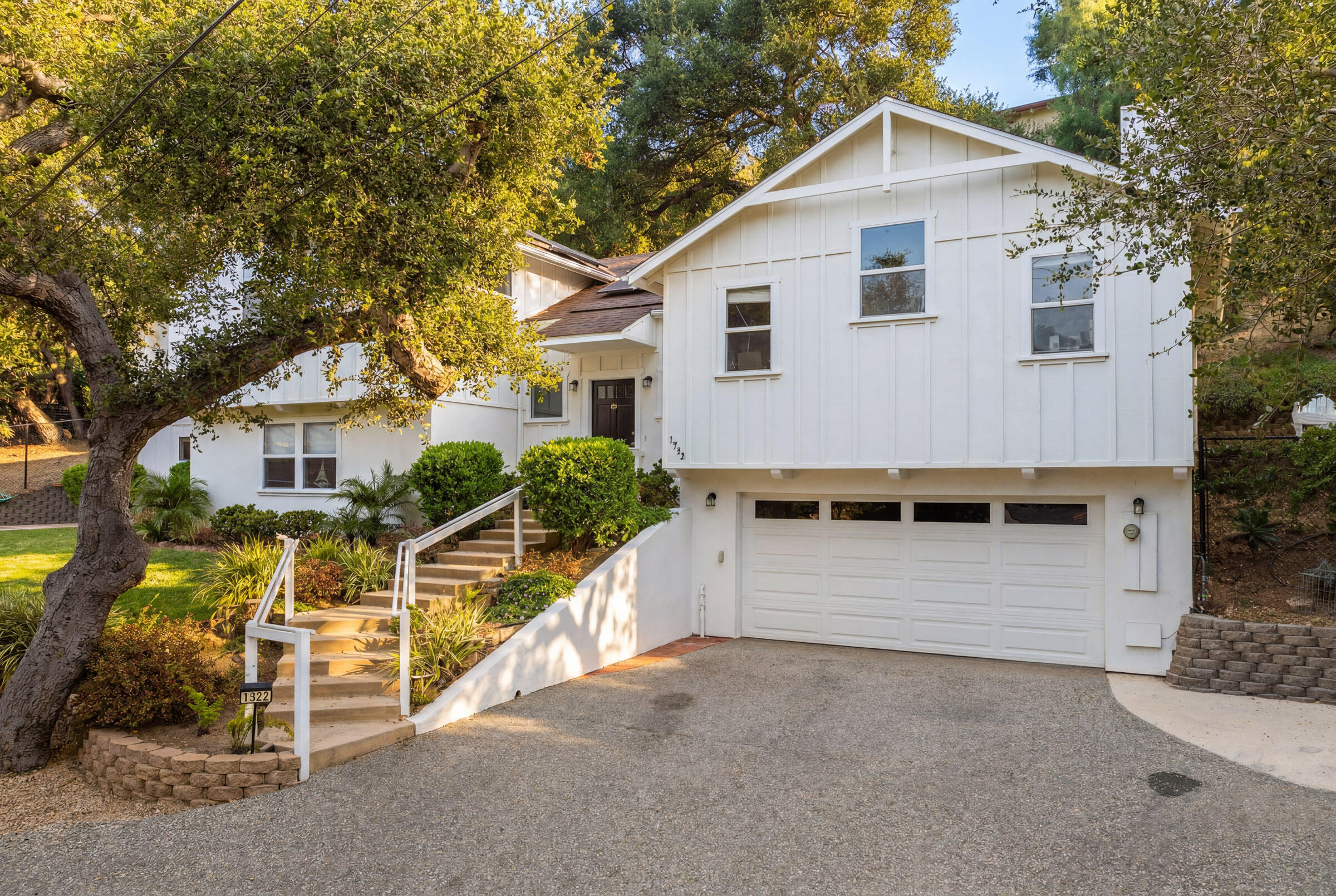 1352 Manitou Road Santa Barbara, CA 93101 - Photo 1 of 27 a front view of a house with a yard