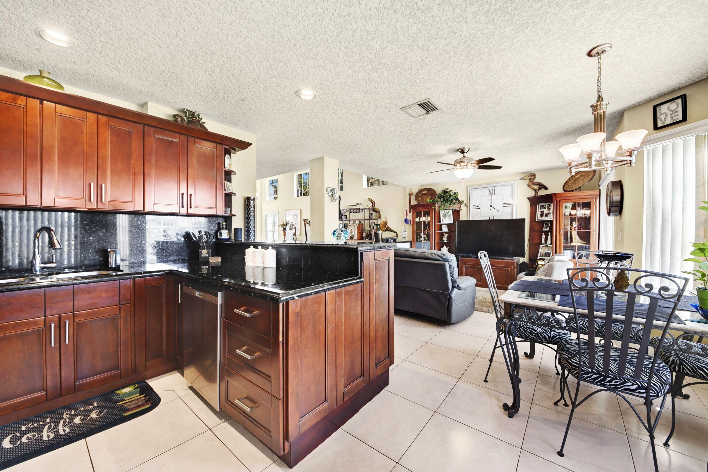 9133 Boca Gardens Circle South, Unit A Boca Raton, FL 33496 - Photo 2 of 16 kitchen family