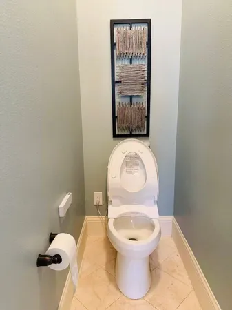 a close view of a toilet in a bathroom