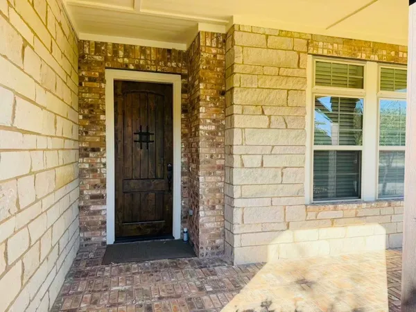a view of a pathway door of the house