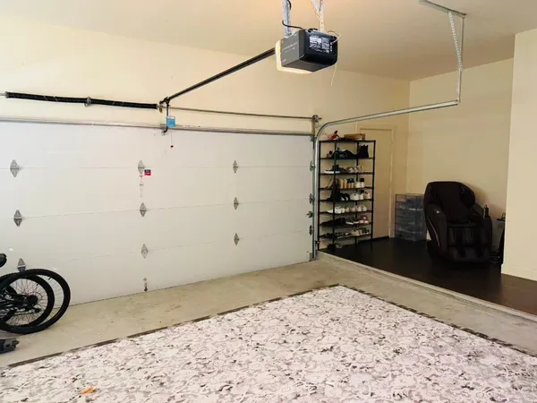 a view of a storage & utility room with a sink