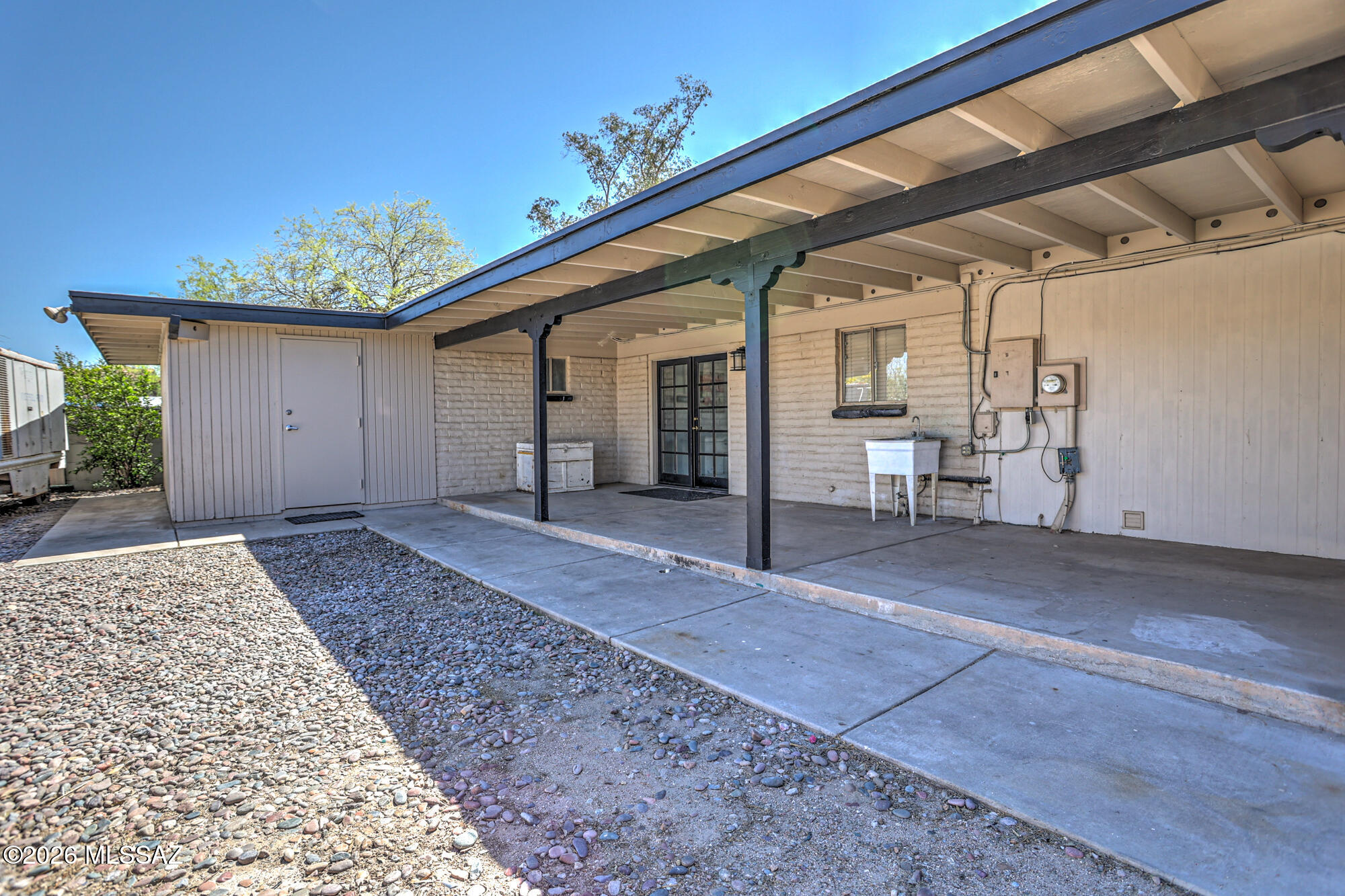 4400 West Ina Road Tucson, AZ 85741 - Photo 36 of 43 a view of a house with a yard