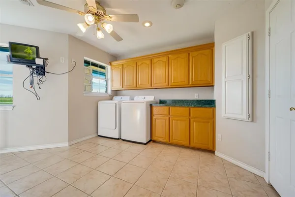 a view of a kitchen with a sink